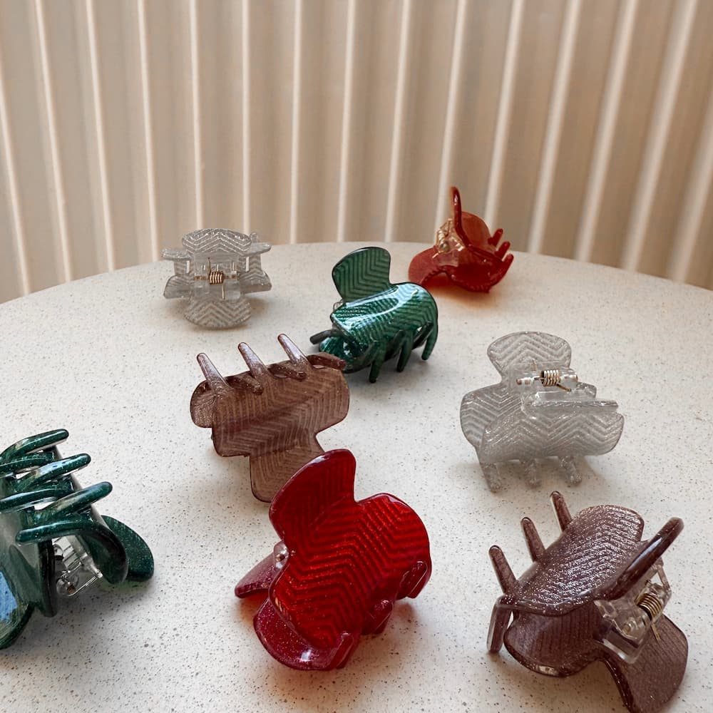 Kleine bunte glitzer Haarklammern in rot, grün, braun und silber